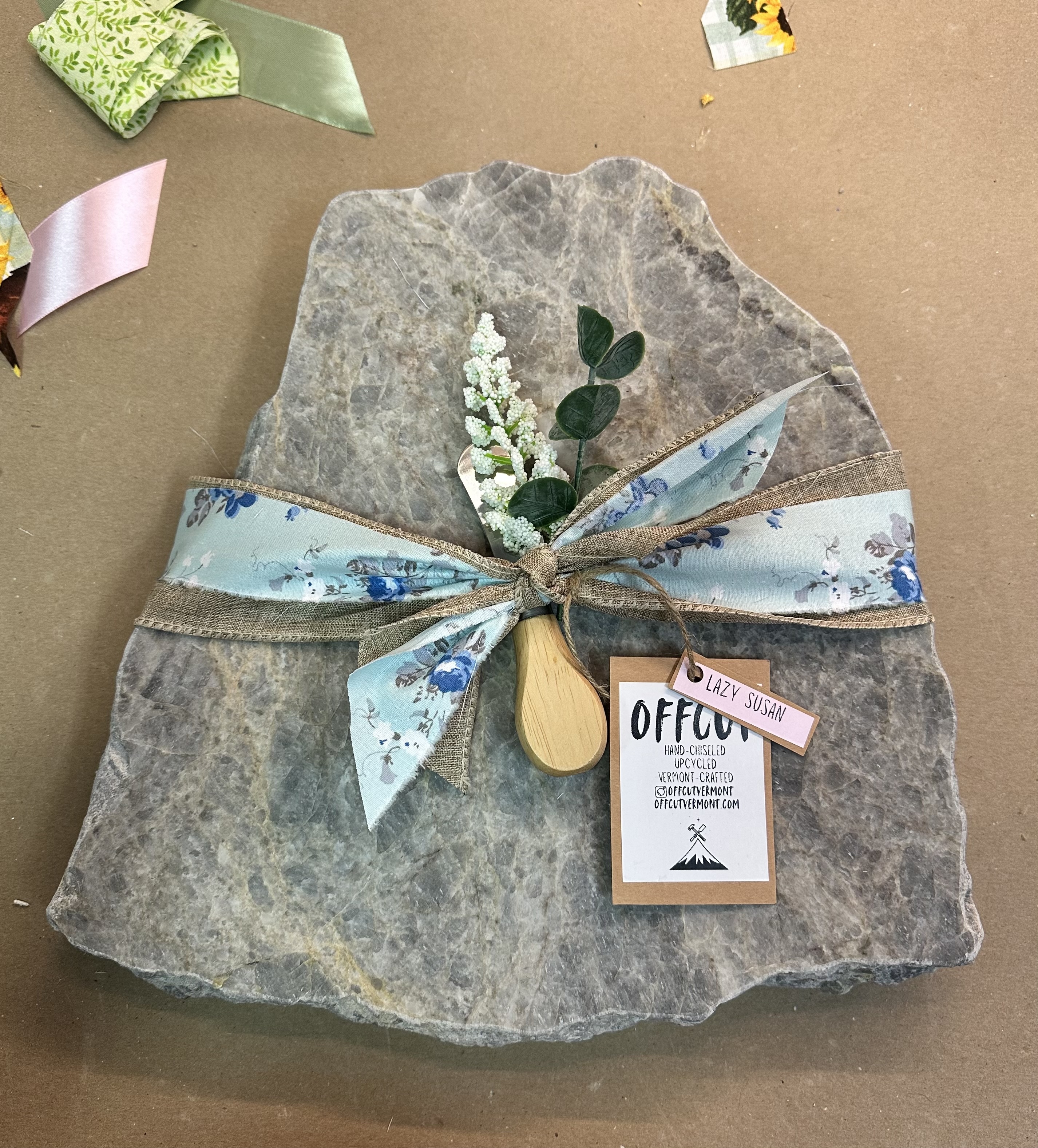 Wrapped Offcut lazy Susan with blue floral ribbon